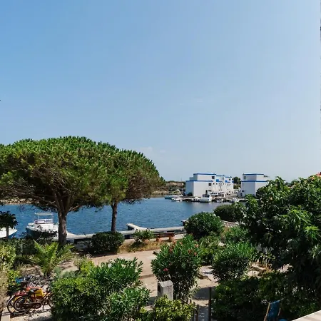 Hébergement de vacances L'ilot Des Barcarelles-vue Etangs-piscine-clim Le Barcarès